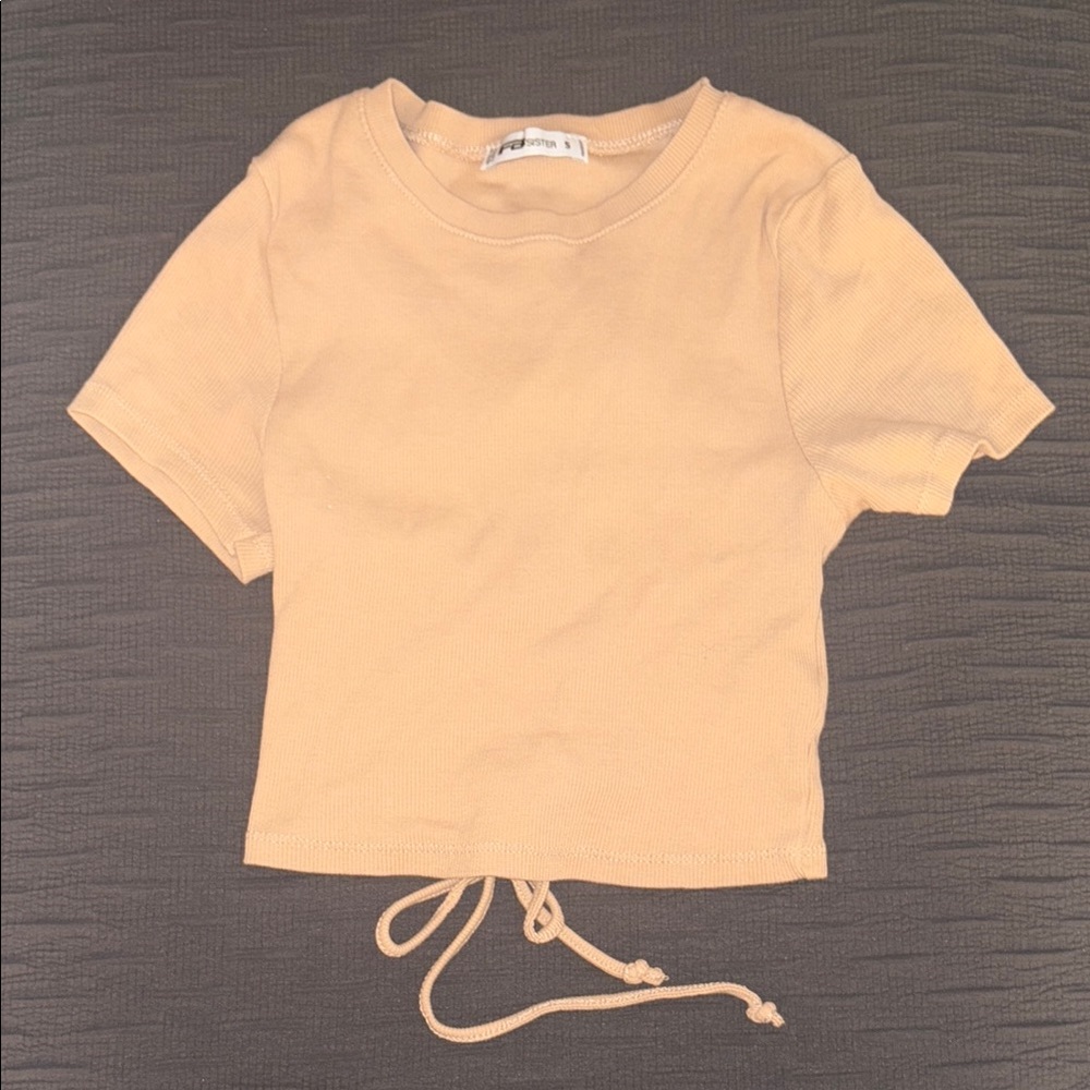 women’s crop top with cute cutout in the back! i only wore it once !